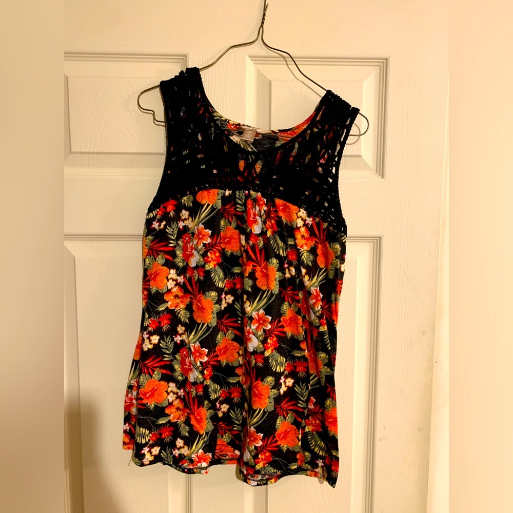 Black and red floral print sleeveless shirt with crochet holes at neck